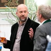 Two men talking with each other